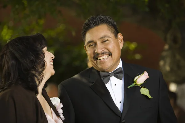 Hispanic couple in evening wear