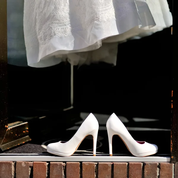 Bridal shoes and wedding dress