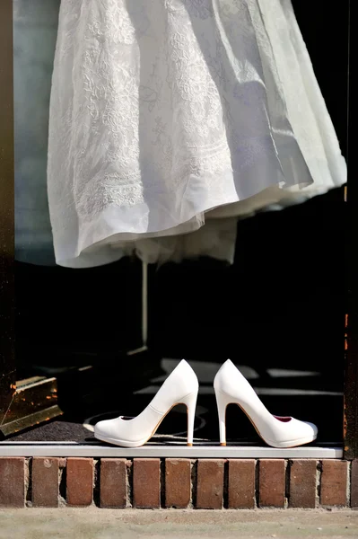 Bridal shoes and wedding dress
