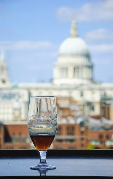 A glass of beer and a view on St Paul Cathedral