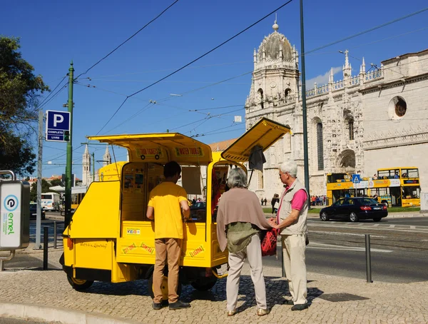 LISBON, PORTUGAL - APRIL 22, 2015: Senior couple getting useful information and maps from the tourist information point near Jeronimos Monastery in Belem quarter.