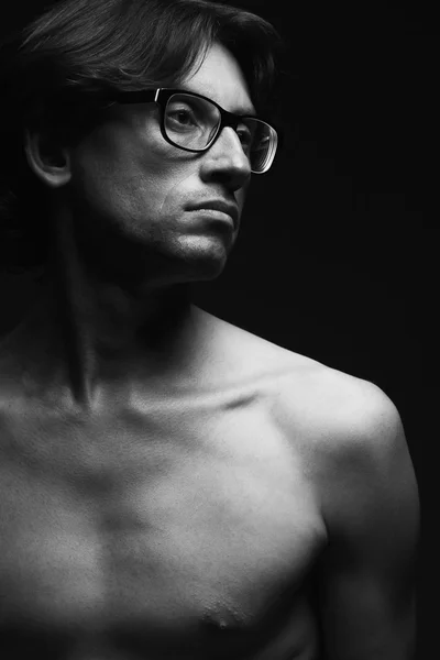 Eyewear concept. Profile portrait of charismatic mature man wearing glasses