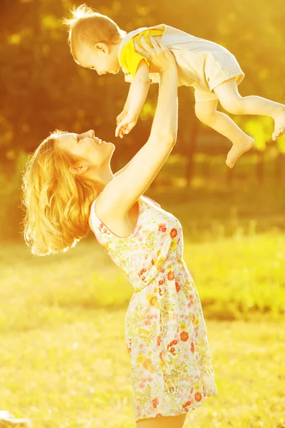 Happy family concept. Portrait of playing mother and little son