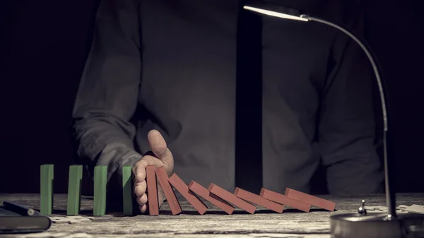 Conceptual image of the Domino Effect