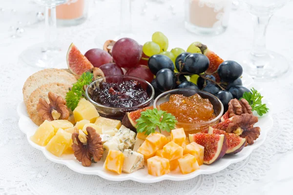 Cheese and fruit plate to the holiday