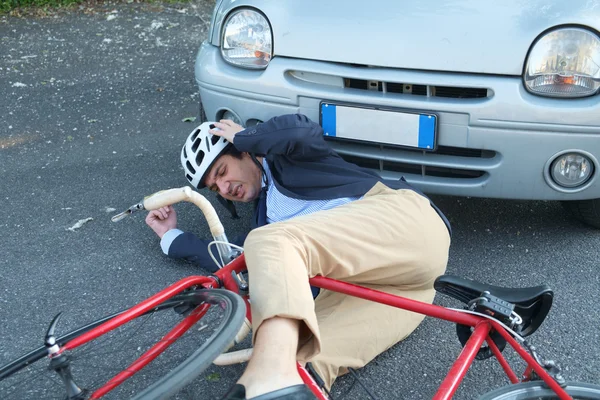 Aching man after bicycle accident