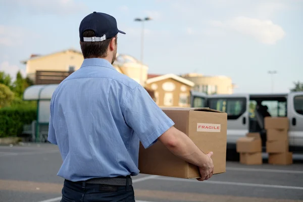 Express courier delivering a box