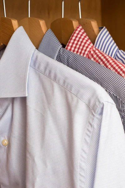 Shirts in several colors and textures