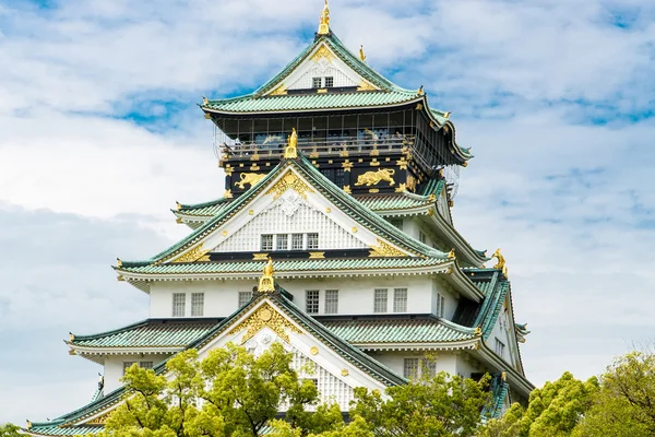 Beautiful Osaka castle in Japan on sunny summer day.