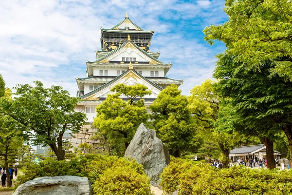 Beautiful Osaka castle in Japan on sunny summer day.