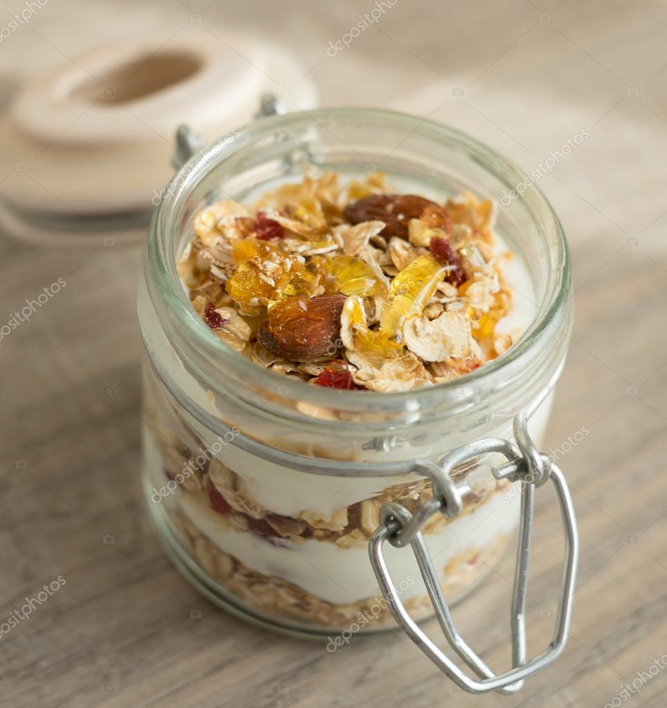 Homemade bircher muesli with toasted rolled oats, dried fruits, nuts ...