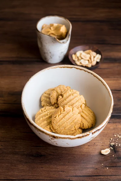 Cookies with peanut butter, nuts in a bowl, selective focus