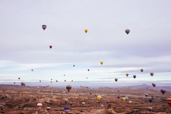 GOREME, CAPPADOCIA, TURKEY - OCTOBER 24, 2015: Cappadocia, Turkey.The greatest tourist attraction of Cappadocia, the flight with the hot air balloons over the valley in Goreme