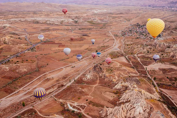 Goreme, Cappadocia, Turkey - October 24, 2015: The hot air balloon flight over the valley.