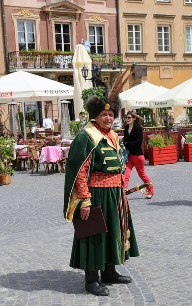 Restaurant Host in Traditional outfit waiting for customers