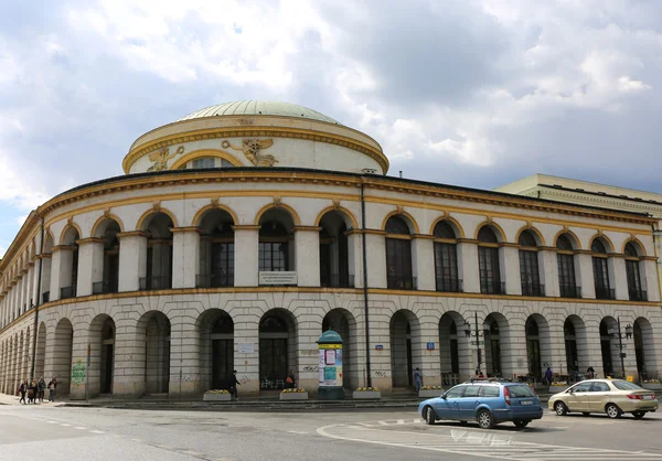 People walking by The Old Museum Building