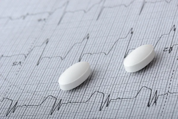 Pills on a heart graph