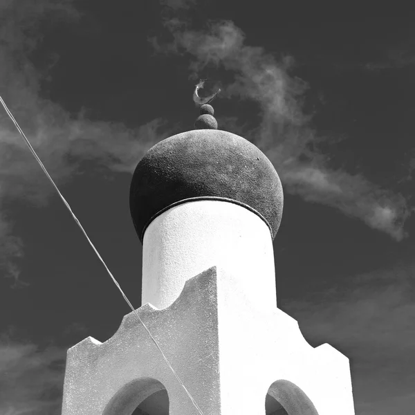 In oman muscat the old mosque minaret and religion in clear sky