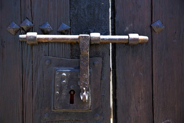 Knocker spain castle lock  door wood in the red brown