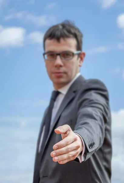 Closeup of business man showing his open hand