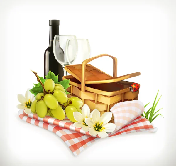 Tablecloth and picnic basket, wine glasses and grapes