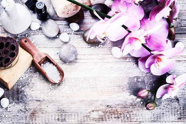 Spa setting with pink orchids