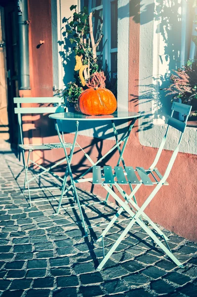 Autumn street decoration with colorful pumpkin