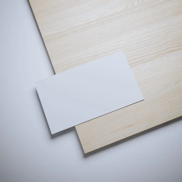 White blank business card and wooden board
