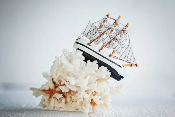 Wooden ship on white background
