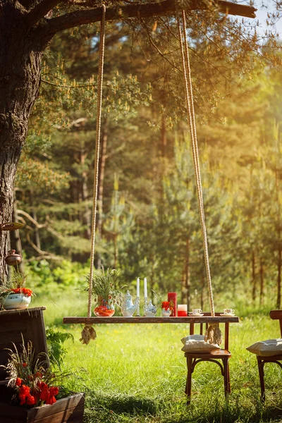 Decor Romantic dinner with  candles,flowers in green forest  dur