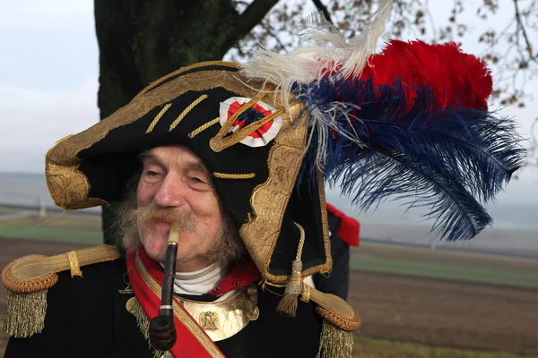 Elderly reenactor uniformed as a French soldier