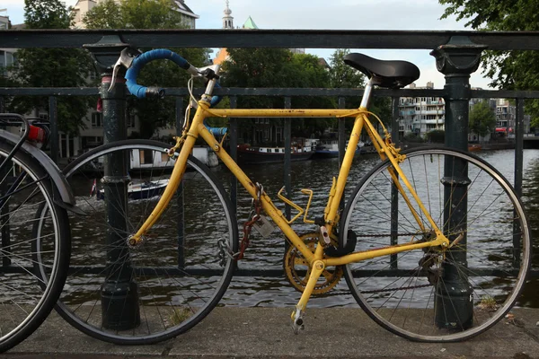 Bicycle parked on the bridge  in Amsterdam
