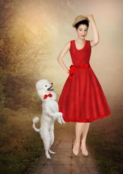 Young girl and poodle
