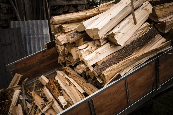 Logging tractor with wood