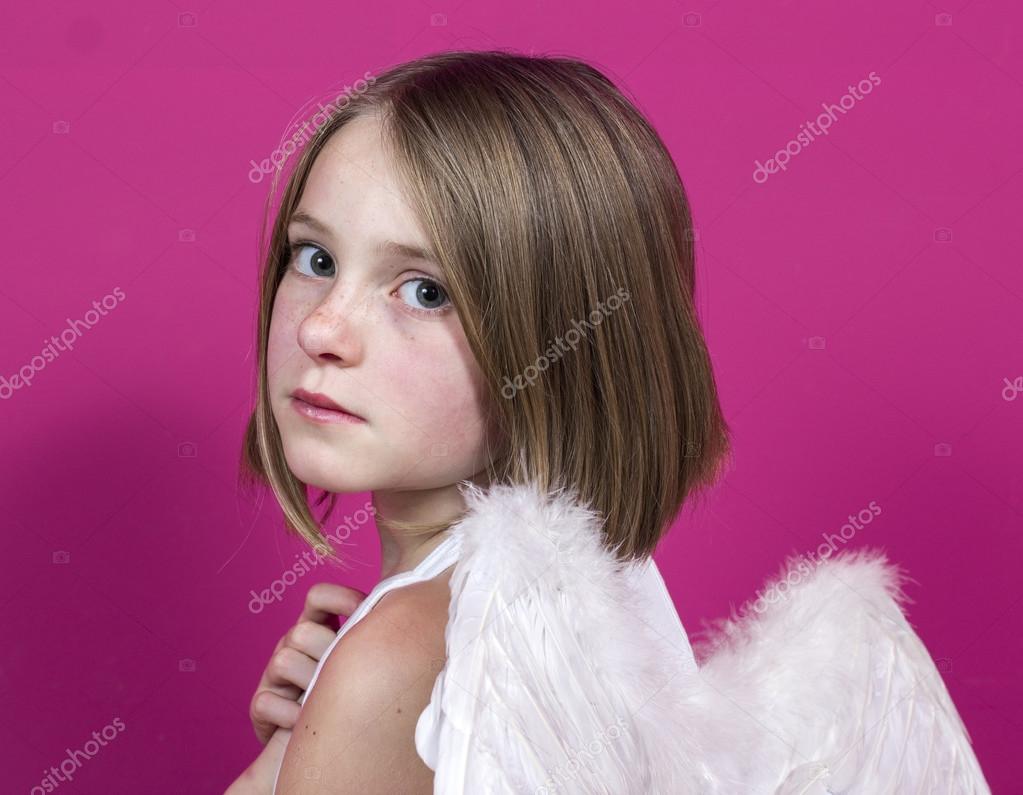 Portrait of an <b>angel little</b> girl posing on purple background — Photo by <b>...</b> - depositphotos_60273761-Angel-little-girl