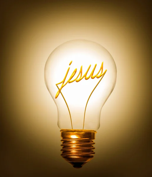 Lightbulb with the word jesus as filament