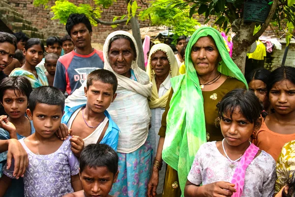 Amroha, Utter Pradesh, INDIA - 2011: Unidentified poor people living in slum