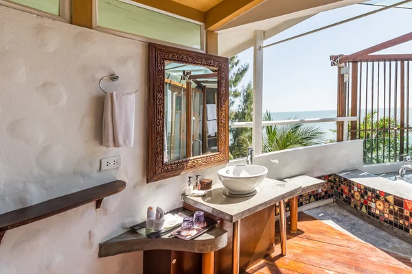 Interior of the modern design bathroom with sea view