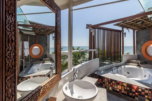 Interior of the modern design bathroom with sea view
