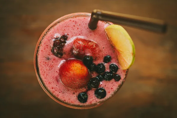 Fresh Blueberry and Strawberry Smoothie on a background