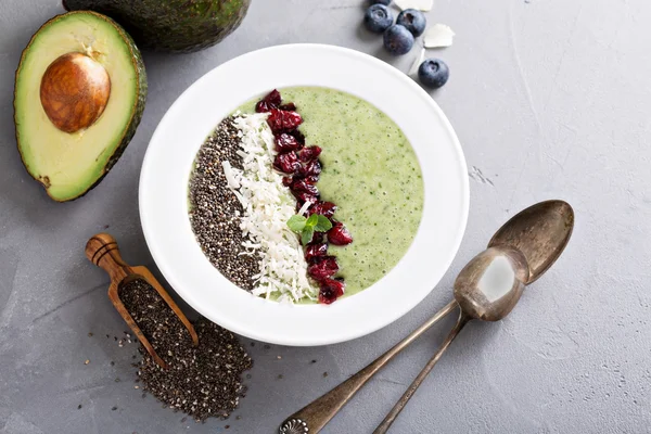 Green smoothie bowl with avocado and chia seeds