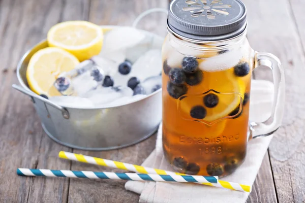 Ice tea with lemon and blueberries