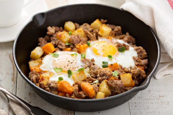 Potato hash with eggs