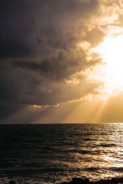 Dramatic Light with Sun Rays and Heavy Clouds