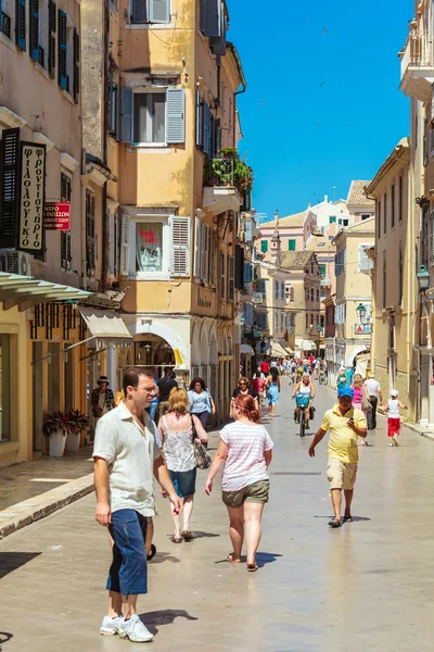 CORFU, GREECE - JULY 7, 2011: Native people and tourist walking