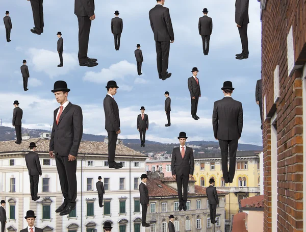 Businessmen floating in the sky