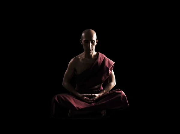 Buddhist monk in meditation pose