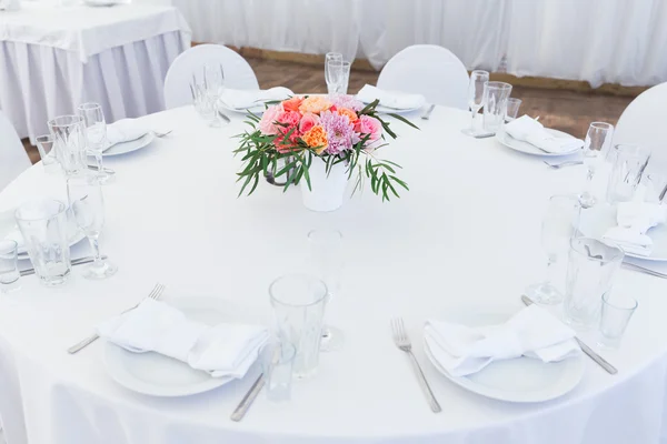 Served white wedding table layout