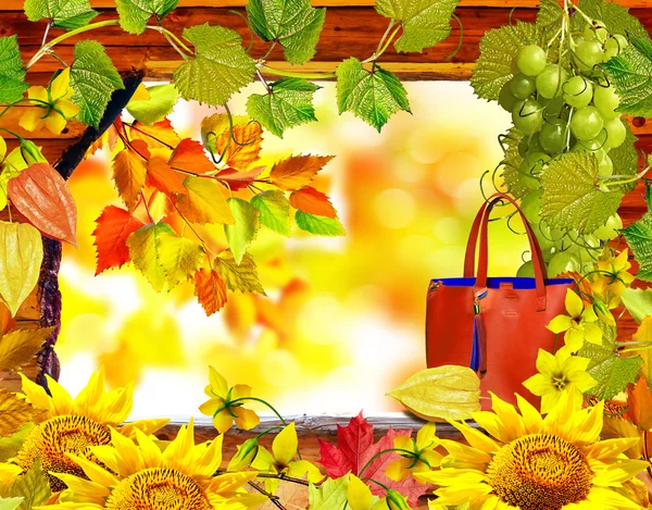 Frame of flowers and autumn foliage. Indian summer