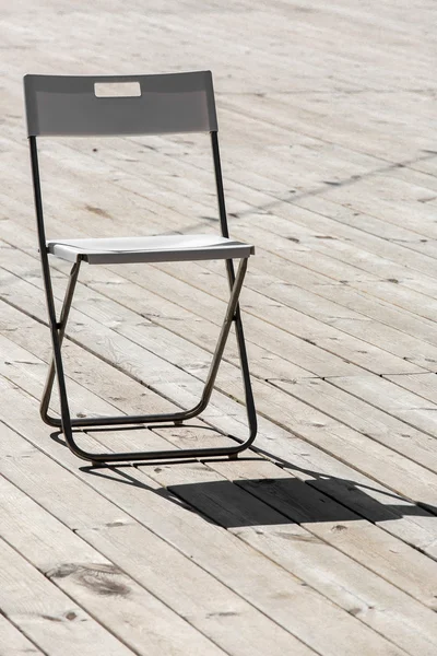 The folding chair.